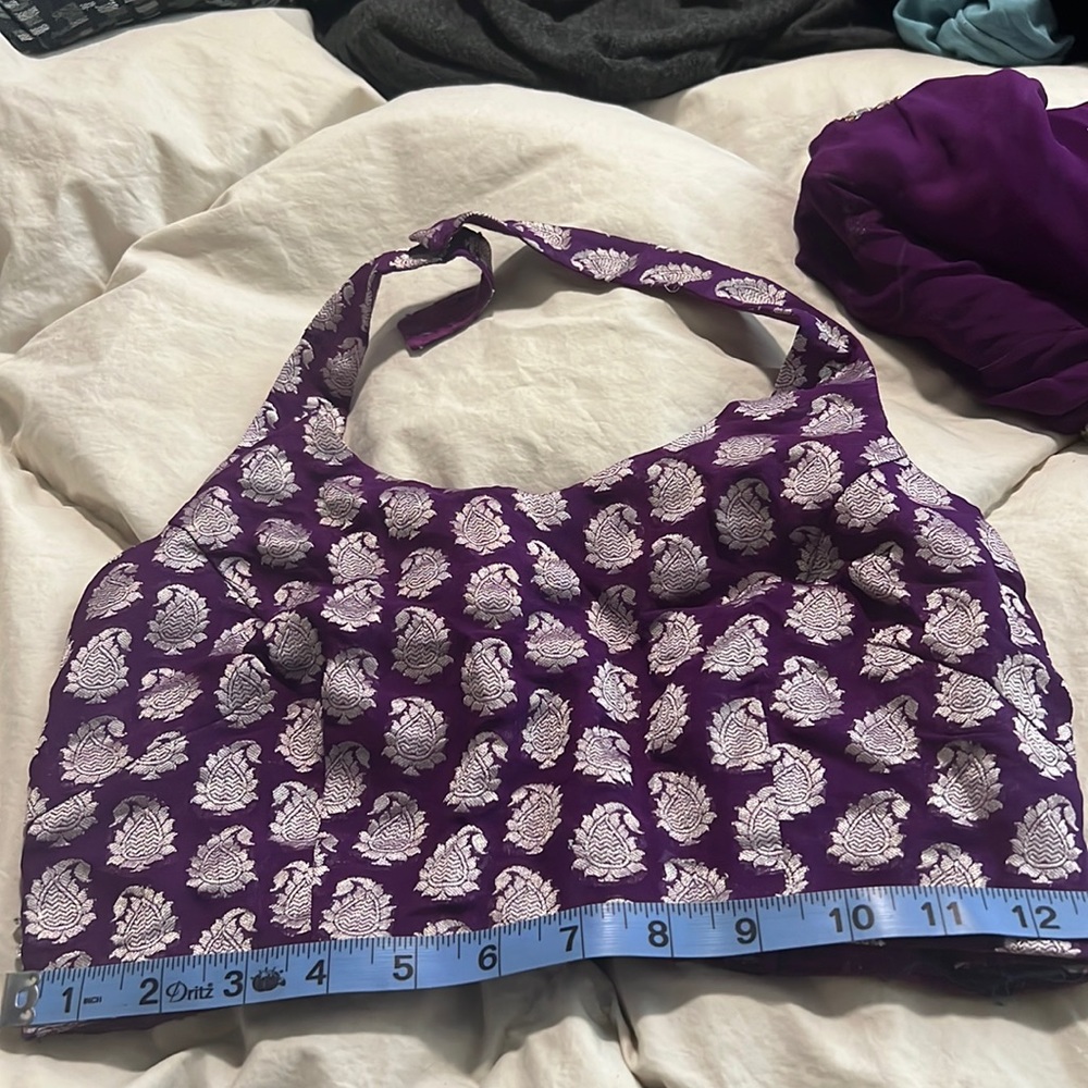 Purple Indian saree with halter style silk blouse.